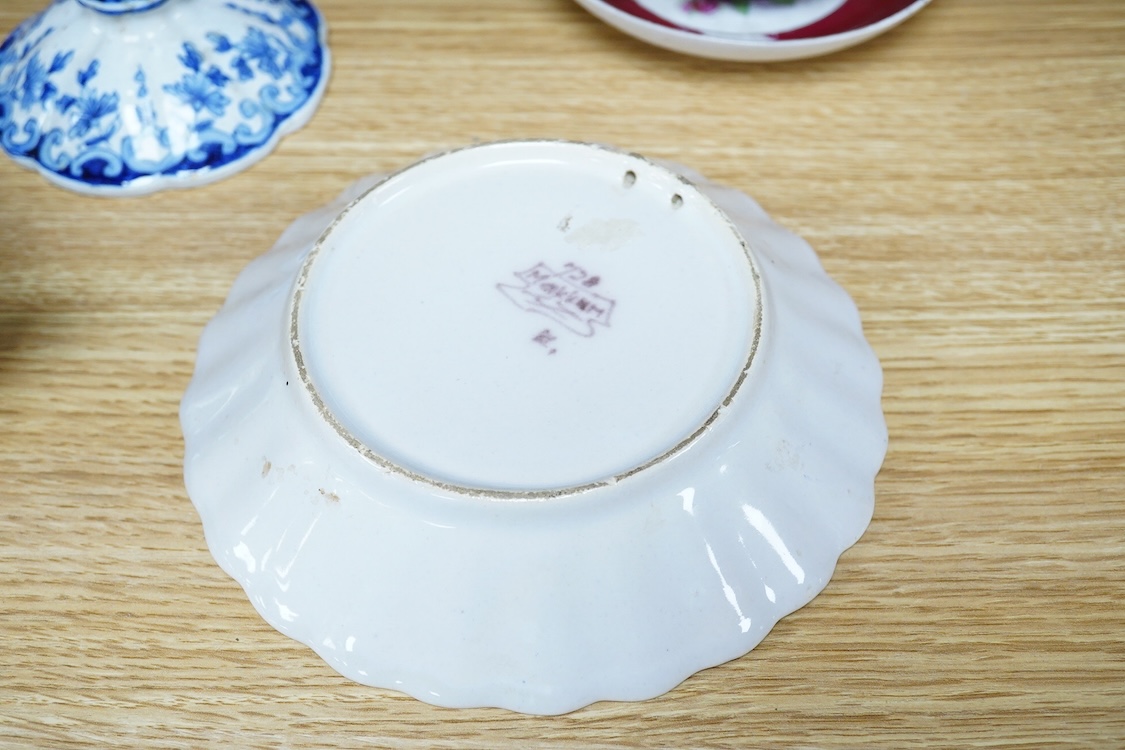 An 18th century Delft plate, two tin-glazed dishes and candlestick, a Gardener Russian porcelain tea cup and saucer, and a mug with liner, largest 22cm in diameter
